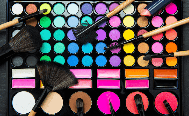 a photo of a makeup set signifying to avoid too much makeup as one of the tips on how to dress modestly in the summer