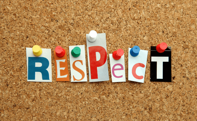 a photo of a cork board with letter clippings that says: RESPECT.