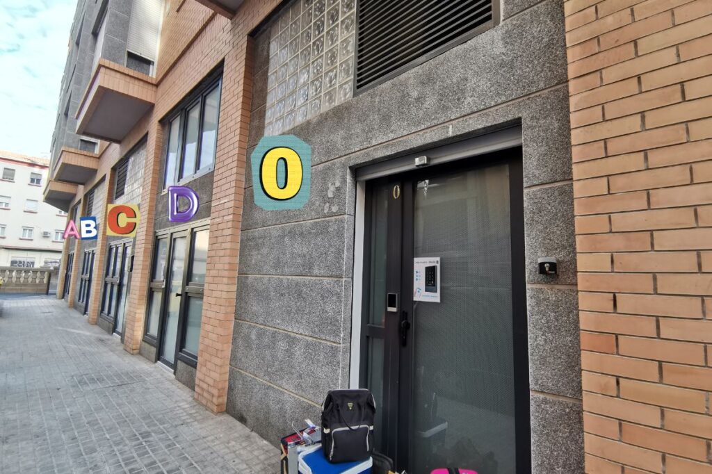 photo of the 5 series of apartments of Grandera apart's - Carbonell 1 with every unit labelled as A, B, C, D, and O.
